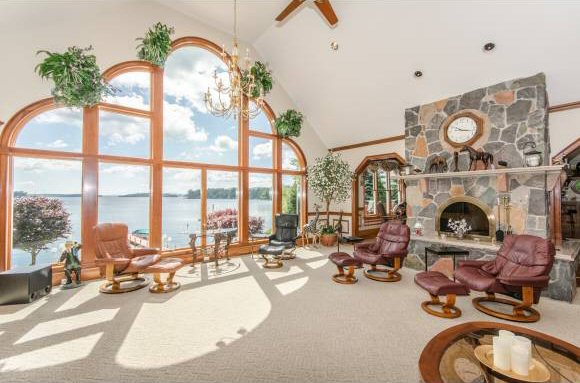 Great room with two fireplaces and views of Rattlesnake Island.